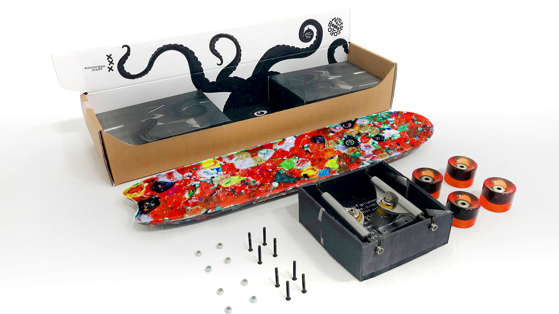 wasteboard skateboard from recycled plastic gift packaging